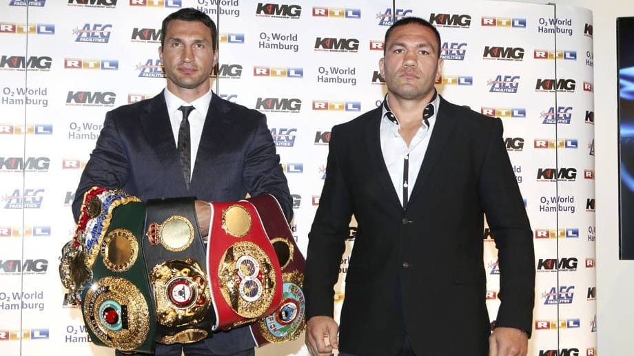 Wladimir Klitschko (li.) muss den WM-Kampf gegen Kubrat Pulev verschieben.