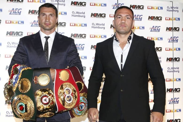 Wladimir Klitschko (li.) muss den WM-Kampf gegen Kubrat Pulev verschieben.