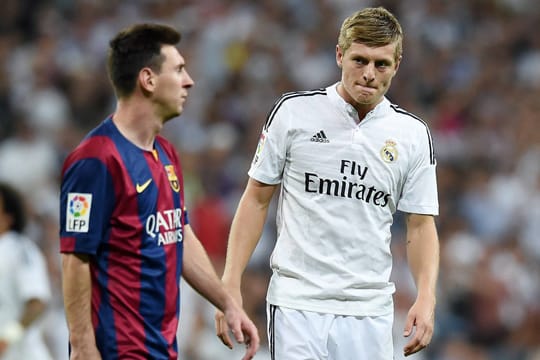 Sieger und Besiegter: Toni Kroos (re.) darf sich freuen, Lionel Messi und Barca haben verloren.