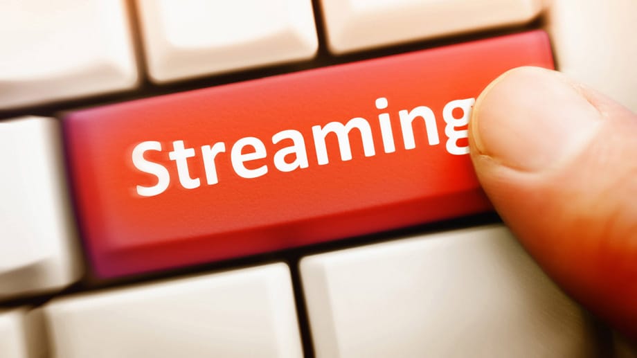 Computertaste mit der Aufschrift Streaming