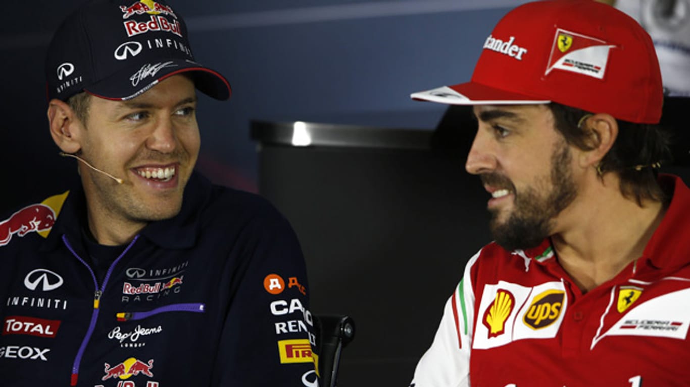 Freude bei Sebastian Vettel (links): Nach Alonsos Weggang zu McLaren dürfte er seinen Wechsel zu Ferrari nun bald offiziell verkünden.
