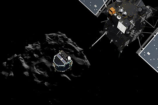 Die Raumsonde Rosetta fliegt über dem Kometen Tschuri durchs All. Dort ist "Philae" gelandet. (Illustration)