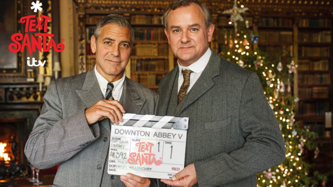 George Clooney und Hugh Bonneville bei Dreharbeiten zu "Donwton Abbey".