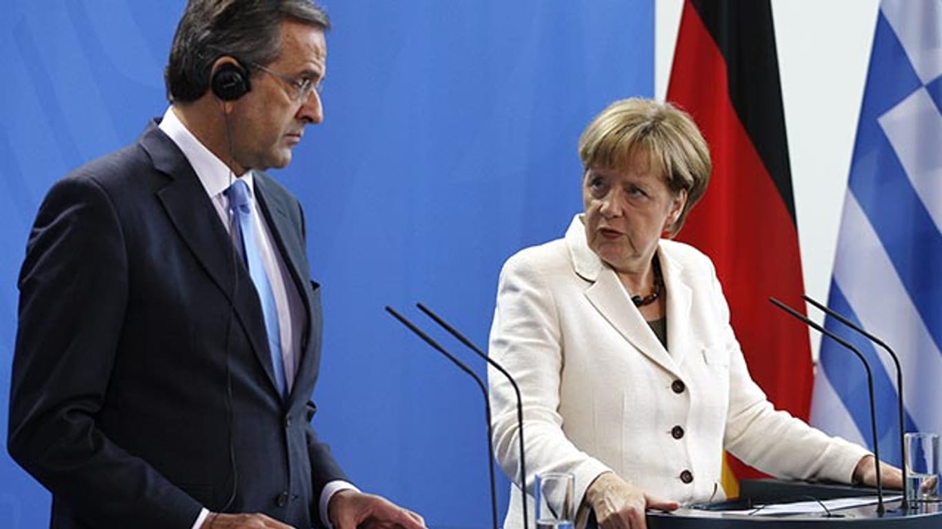 Athener Regierungschef Saramas, Kanzlerin Merkel: Sparkurs ist alternativlos
