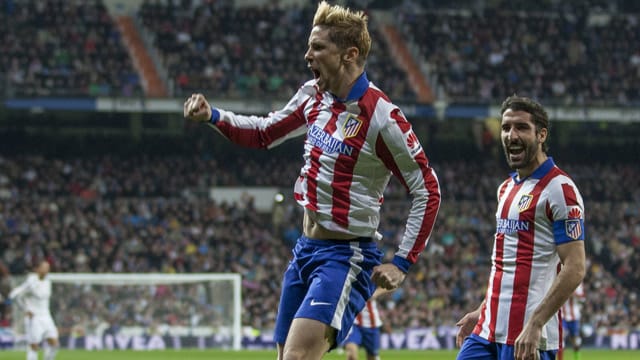 Atletico-Stürmer Fernando Torres bejubelt einen seiner beiden Treffer gegen Real im spanischen Pokal. Atletico-Stürmer Fernando Torres bejubelt einen seiner beiden Treffer gegen Real im spanischen Pokal.