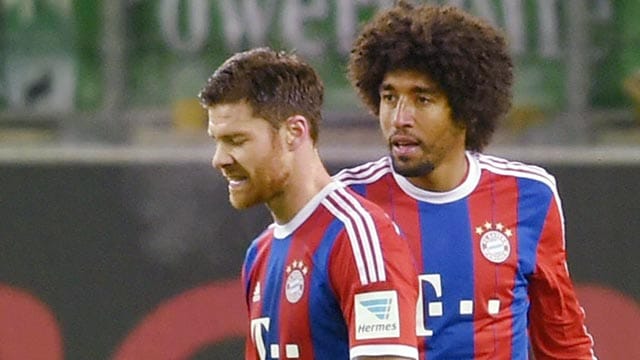 Nicht die sprintstärksten: Xabi Alonso (li.) und Dante (re.)
