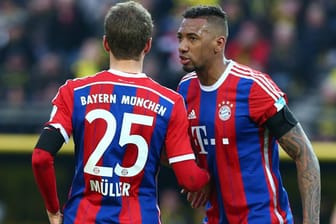 Beim Bundesliga-Spiel in Leverkusen angeblich nicht im Bayern-Kader: Thomas Müller (li.) und Jerome Boateng.