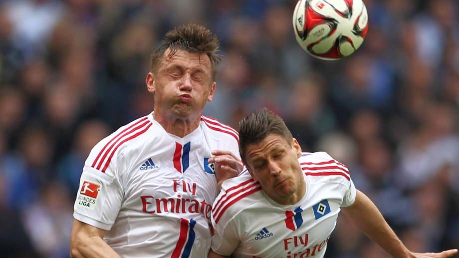 Erkämpfen mit dem HSV ein Unentschieden: Ivica Olic (re.) und Ivo Illicevic. Erkämpfen mit dem HSV ein Unentschieden: Ivica Olic (re.) und Ivo Illicevic.
