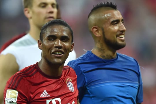 Bayerns Neuzugänge Douglas Costa (li.) und Arturo Vidal bringen Qualität und Internationalität.