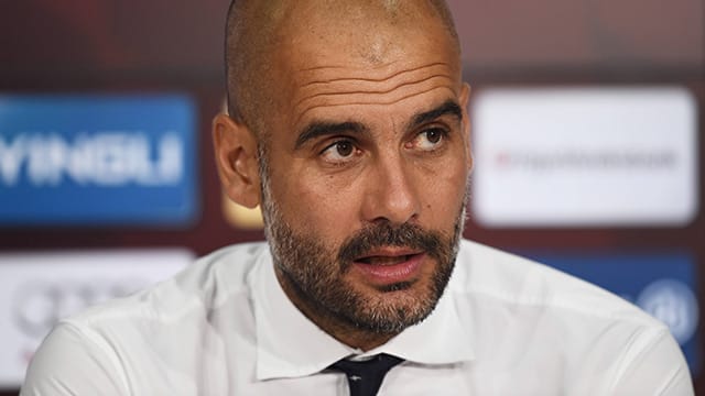 Pep Guardiola freut sich auf das Duell mit Borussia Dortmund. Pep Guardiola freut sich auf das Duell mit Borussia Dortmund.