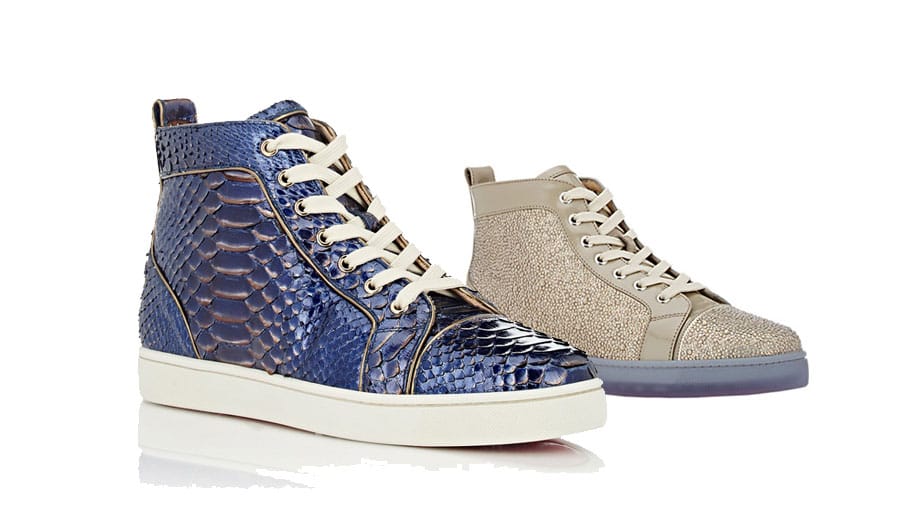 Schuhgott Christian Louboutin designt eher ausgefallene Sneaker aus Pythonleder (um 1750 Euro) oder mit Strass übersäht (um 2500 Euro).