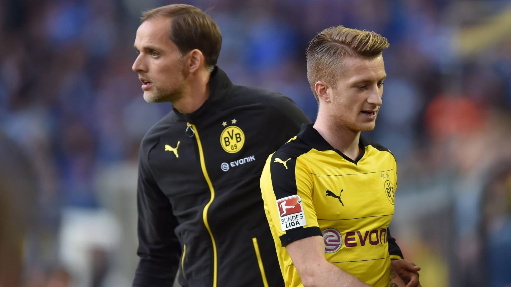 Trainer Thomas Tuchel (li.) setzt Marco Reus vor allem auf der rechten Seite ein.