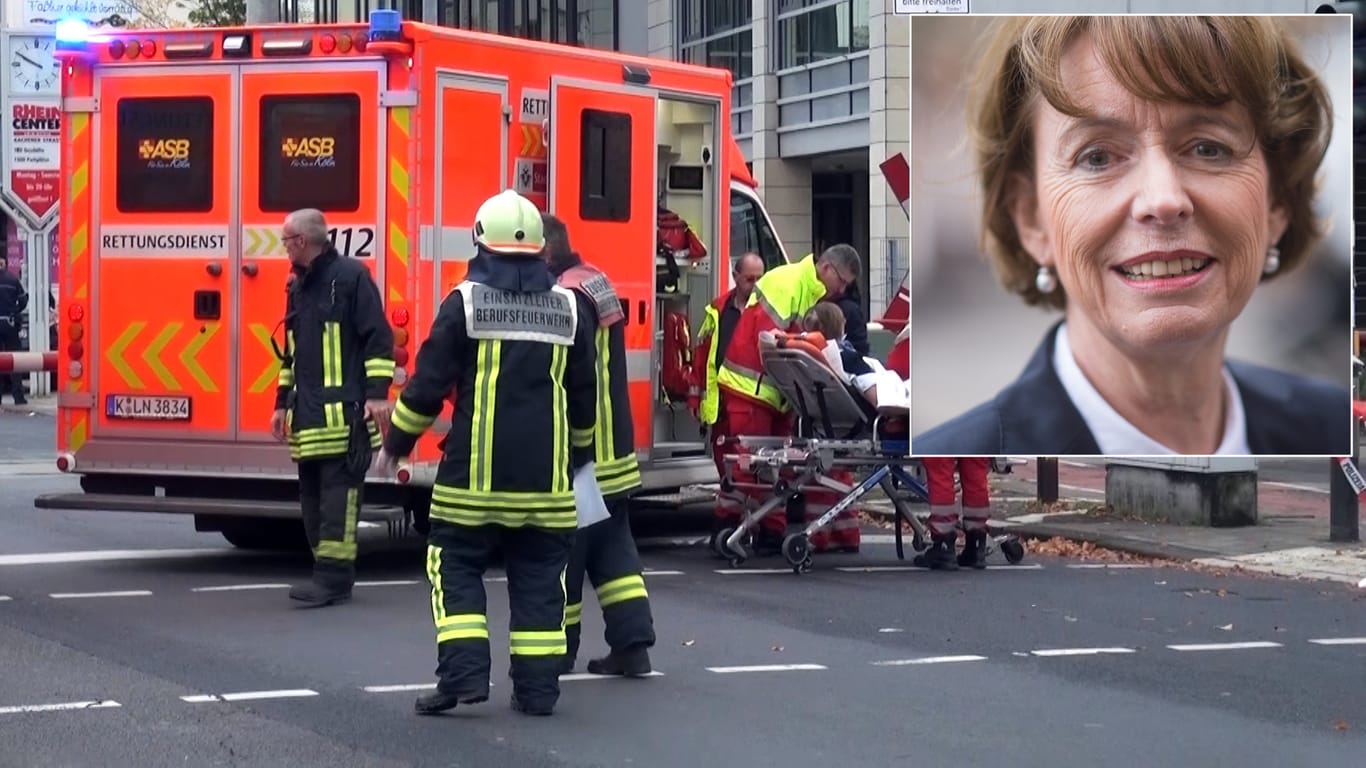 OB-Kandidatin Henriette Reker wird nach dem Angriff auf sie mit dem Krankenwagen abtransportiert.