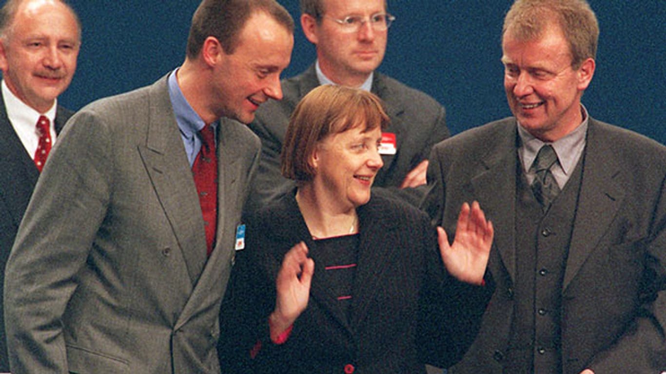 Merkel als neue CDU-Chefin mit Friedrich Merz (l.) und Ruprecht Polenz.