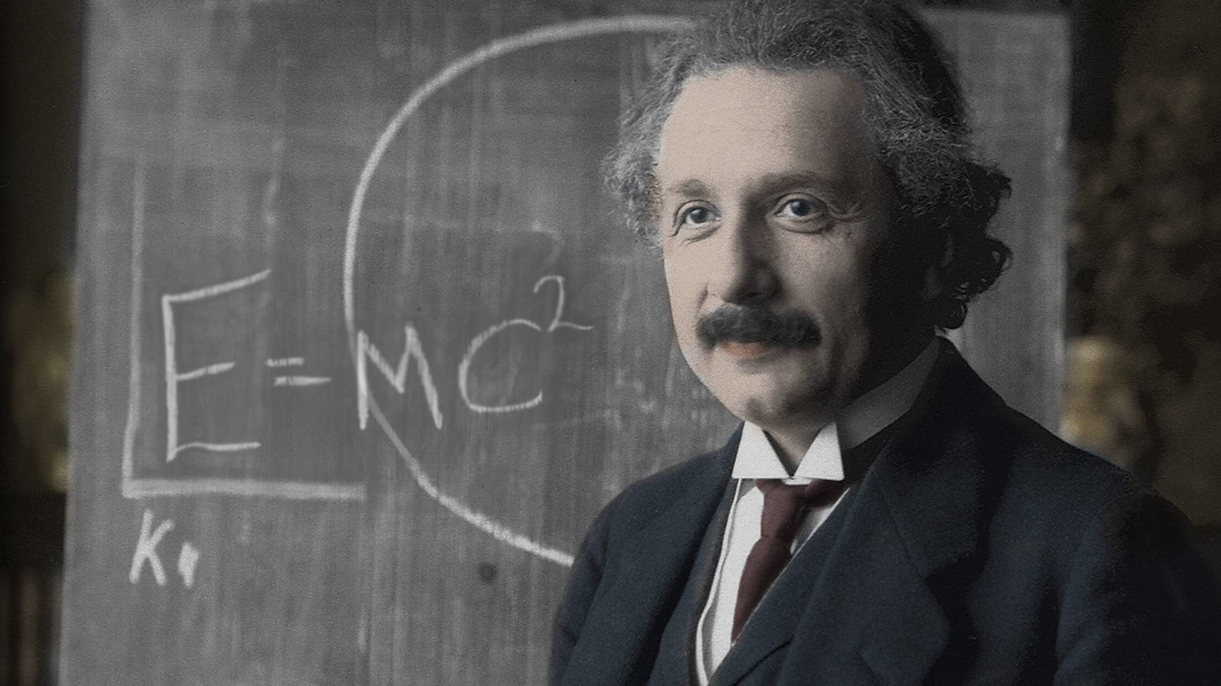 Albert Einstein und die Formel seiner Relativitätstheorie.