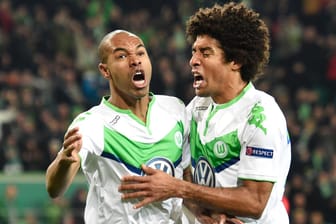 Da kommt Freude auf: Naldo und Dante stehen mit dem VfL Wolfsburg im Achtelfinale der Champions League.