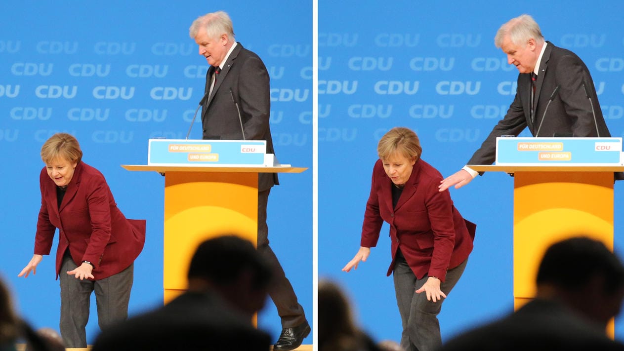 Merkel stolpert kurz, als sie Seehofer auf dem Parteitag verabschiedet.