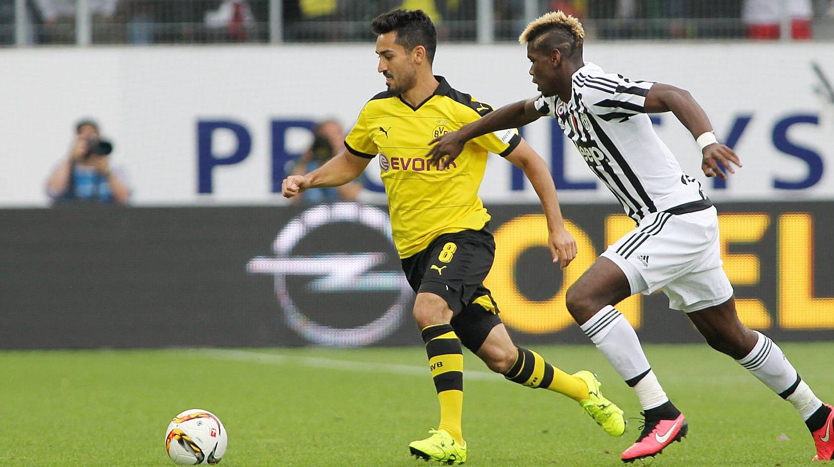 Bald im selben Team? Dortmunds Ilkay Gündogan (li.) und Paul Pogba von Juventus Turin.