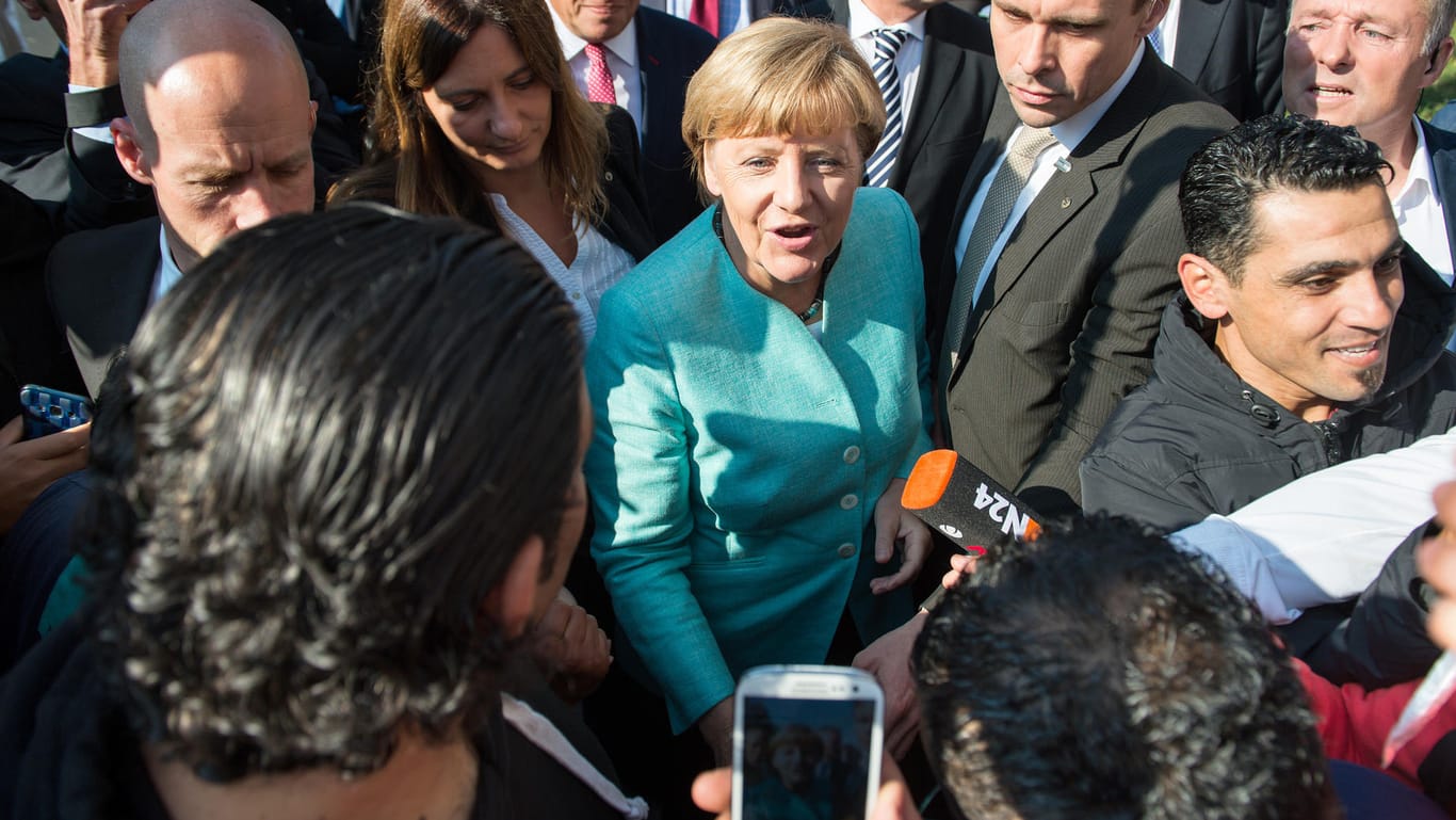 Kanzlerin Angela Merkel: "Den Flüchtlingen offen und freundlich begegnen".