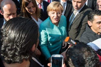 Kanzlerin Angela Merkel: "Den Flüchtlingen offen und freundlich begegnen".