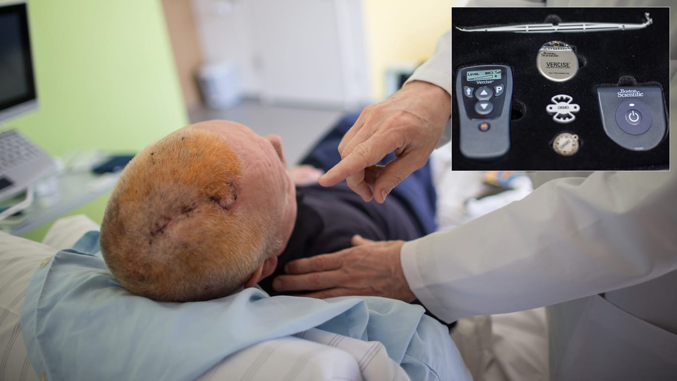 Parkinson: Hirnforscher Alfons Schnitzler untersucht einen Parkinson Patienten, dem ein Hirnschrittmacher eingesetzt wurde.