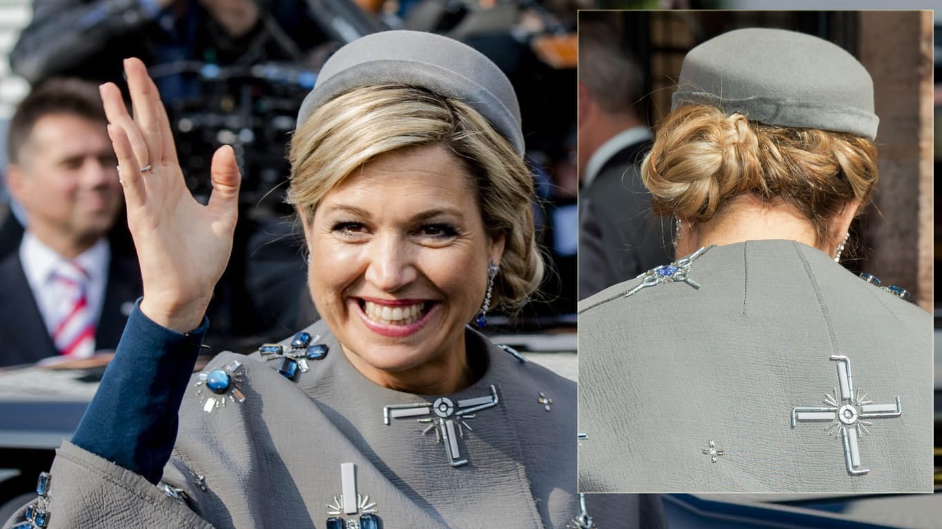 Bei ihrem Bayern-Besuch sorgte Königin Maxima mit ihrem grauen Mantel für Furore im Netz. Einige meinten, darauf ein Hakenkreuz zu erkennen.