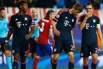 Nachdenklich: David Alaba, Thomas Müller und Philipp Lahm (von links) müssen mit dem FC Bayern um den Final-Einzug in der Champions League bangen.