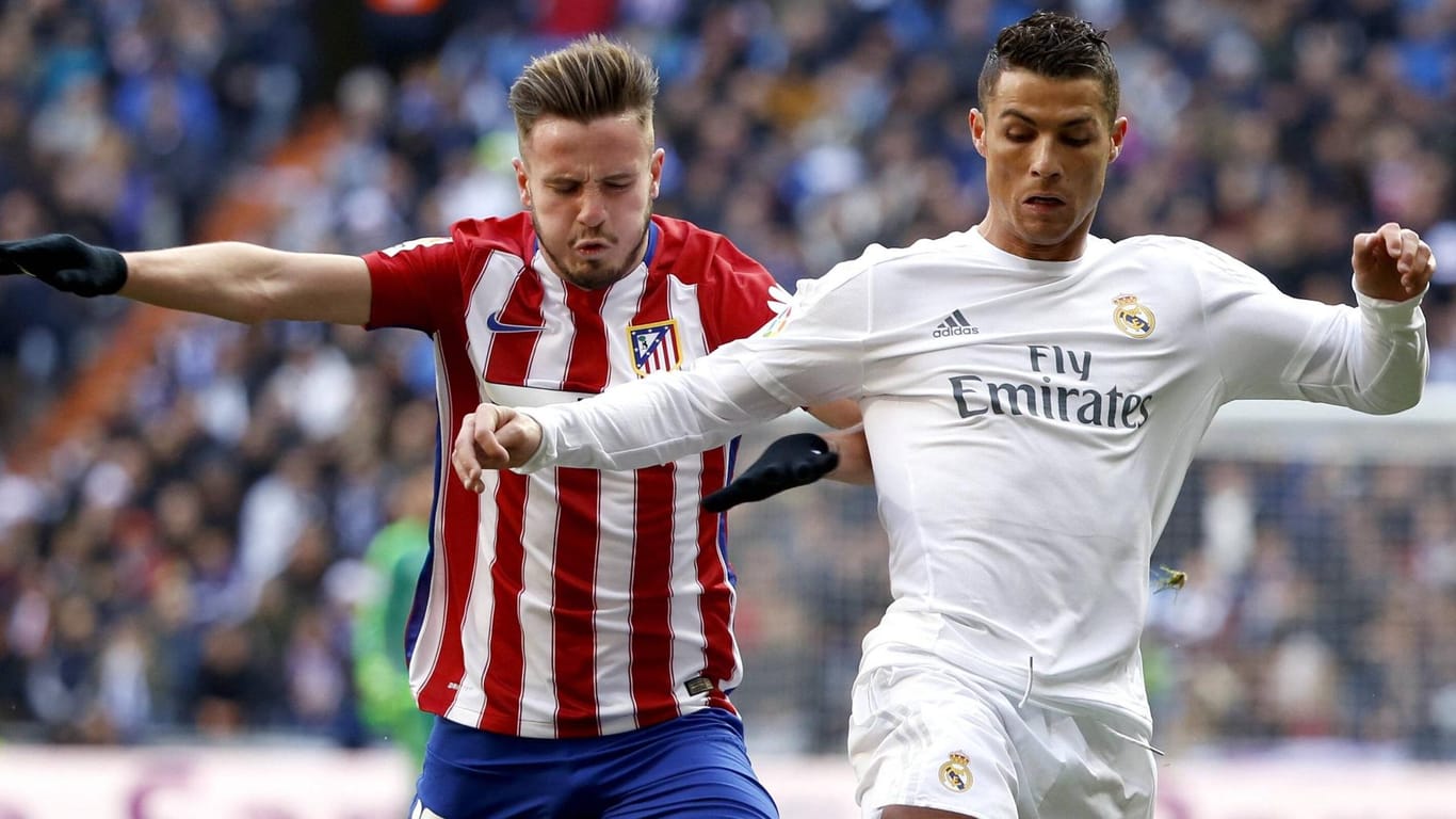 Stehen sich im Finale der Champions League gegenüber: Atléticos Saul (li.) and Cristiano Ronaldo von Real.