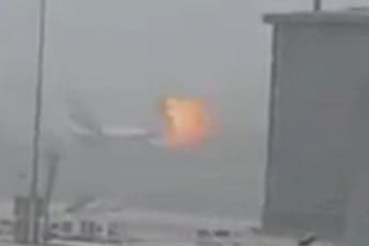 A still picture taken from an amateur video shows the moment an explosion occurs on an Emirates Airline airplane, on the tarmac of Dubai airport, the UAE