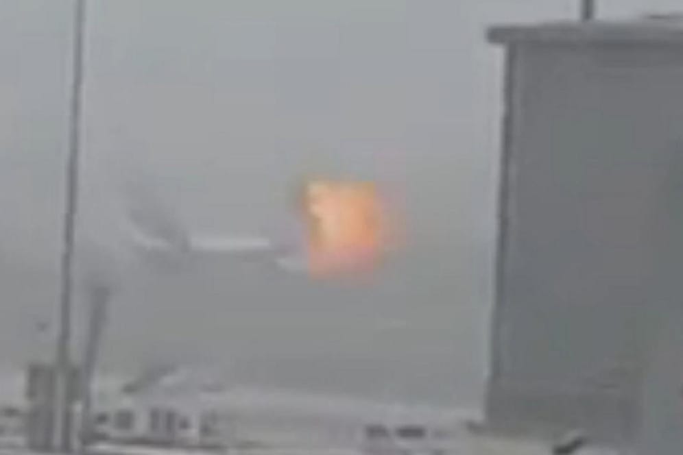 A still picture taken from an amateur video shows the moment an explosion occurs on an Emirates Airline airplane, on the tarmac of Dubai airport, the UAE