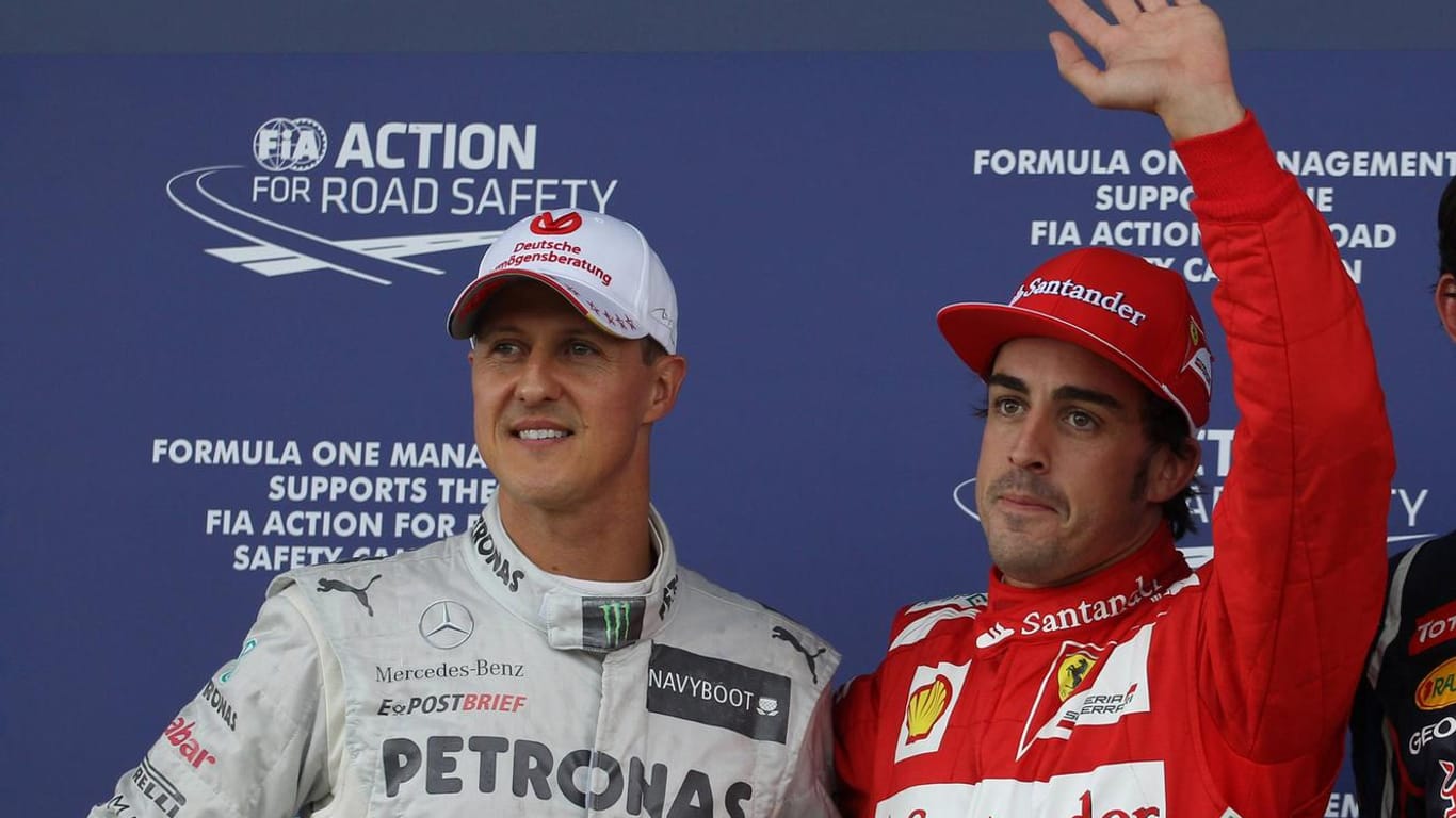 Michael Schumacher (links) und Fernando Alonso, hier ein Archivbild aus dem Jahre 2012.