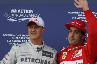 Michael Schumacher (links) und Fernando Alonso, hier ein Archivbild aus dem Jahre 2012.