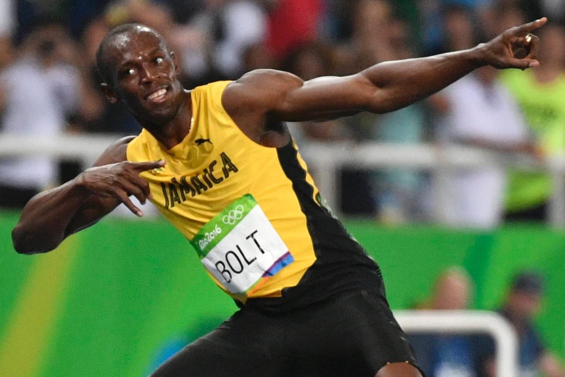 In gewohnter Pose: Usain Bolt lässt sich nach seinem Triumph über 200 Meter feiern.