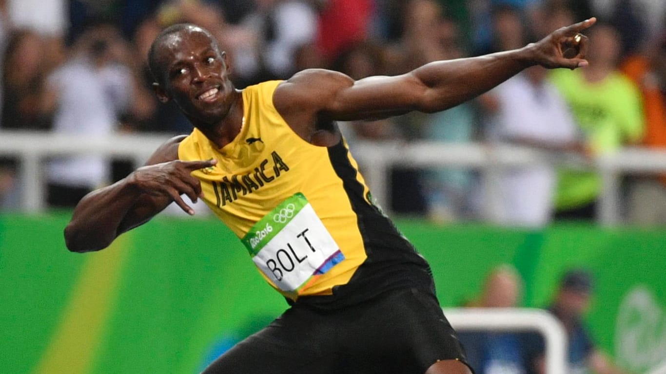 In gewohnter Pose: Usain Bolt lässt sich nach seinem Triumph über 200 Meter feiern.