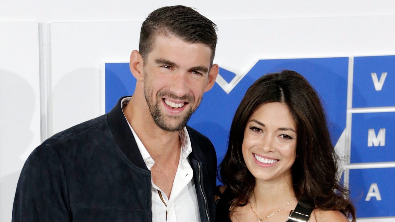 US-Schwimmer Michael Phelps hat seine Verlobte Nicole Johnson mitgebvracht.