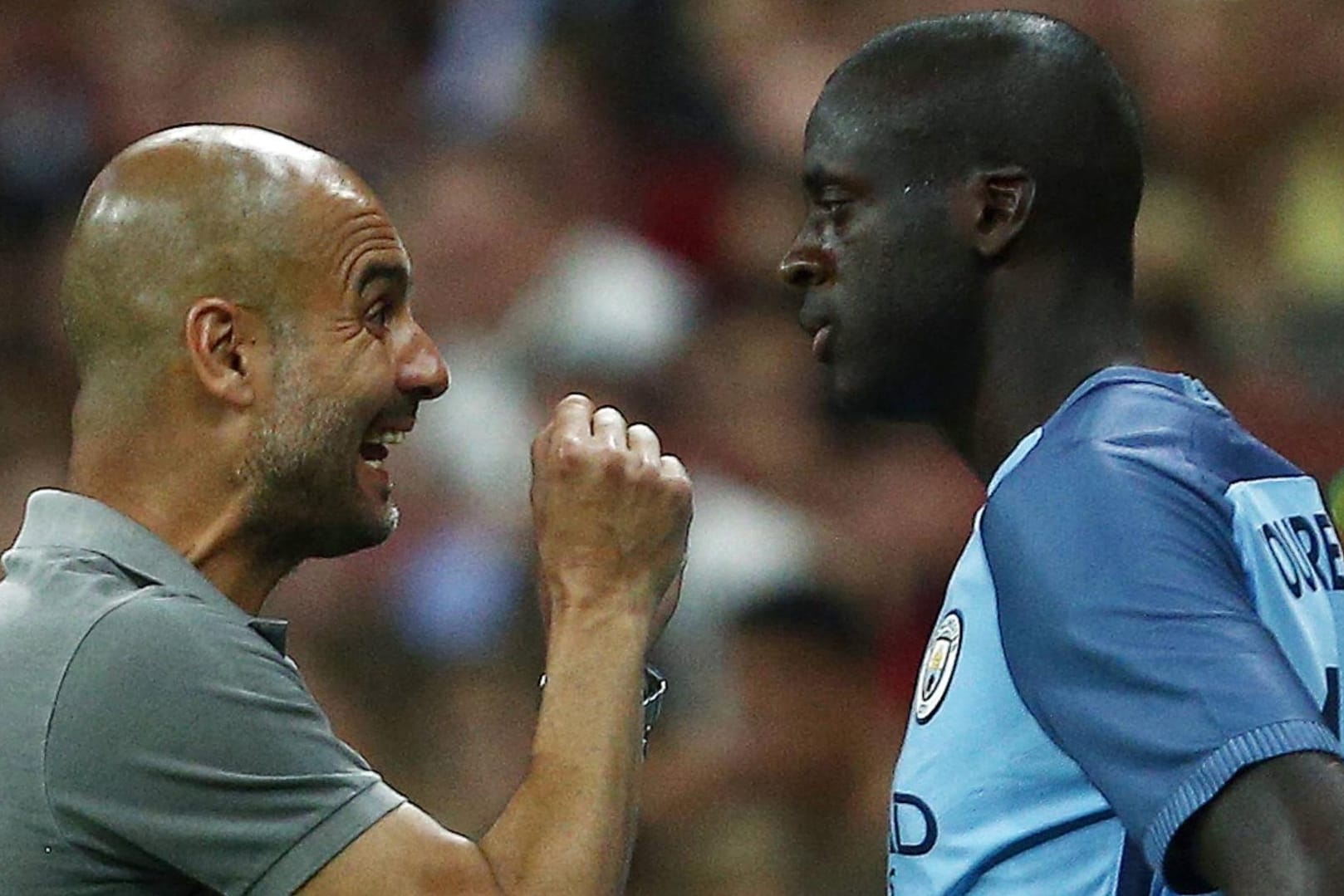 Zwischen Pep Guardiola (li.) und dem Lager von Yaya Touré sind die Fronten verhärtet.