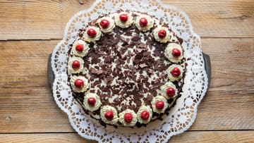 Popular in Germany and around the world: the Black Forest cake.  Chocolate mushroom base flavored with kirsch, cherries and cream gives the cake its characteristic taste.