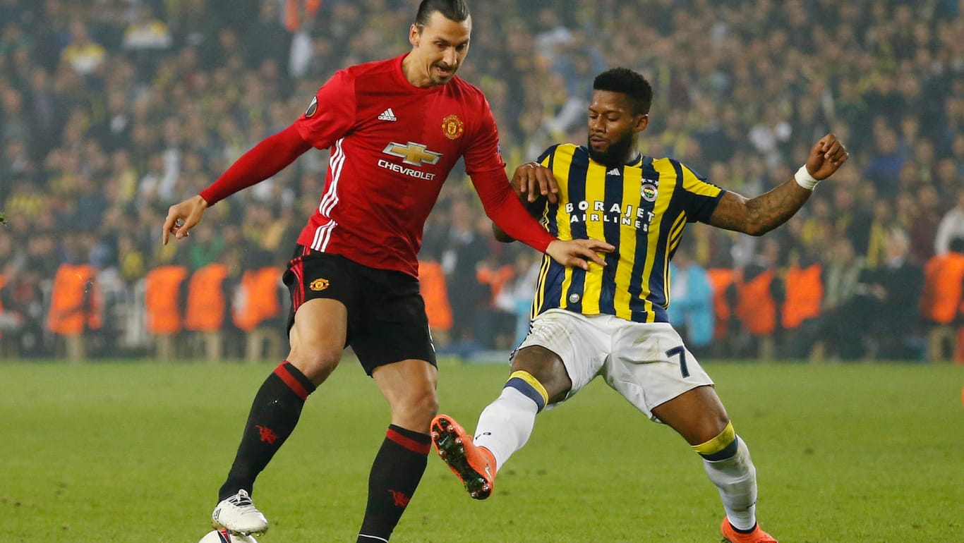 Manchester United's Zlatan Ibrahimovic in action with Fenerbahce's Jeremain Lens