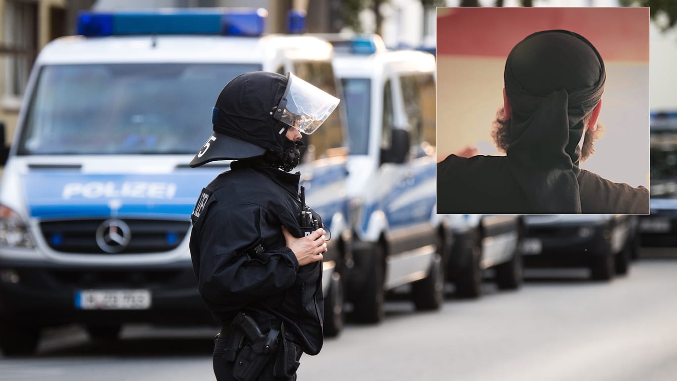 Polizist beim Einsatz in Hildesheim. Zu den Festgenommenen gehört der "Prediger ohne Gesicht".