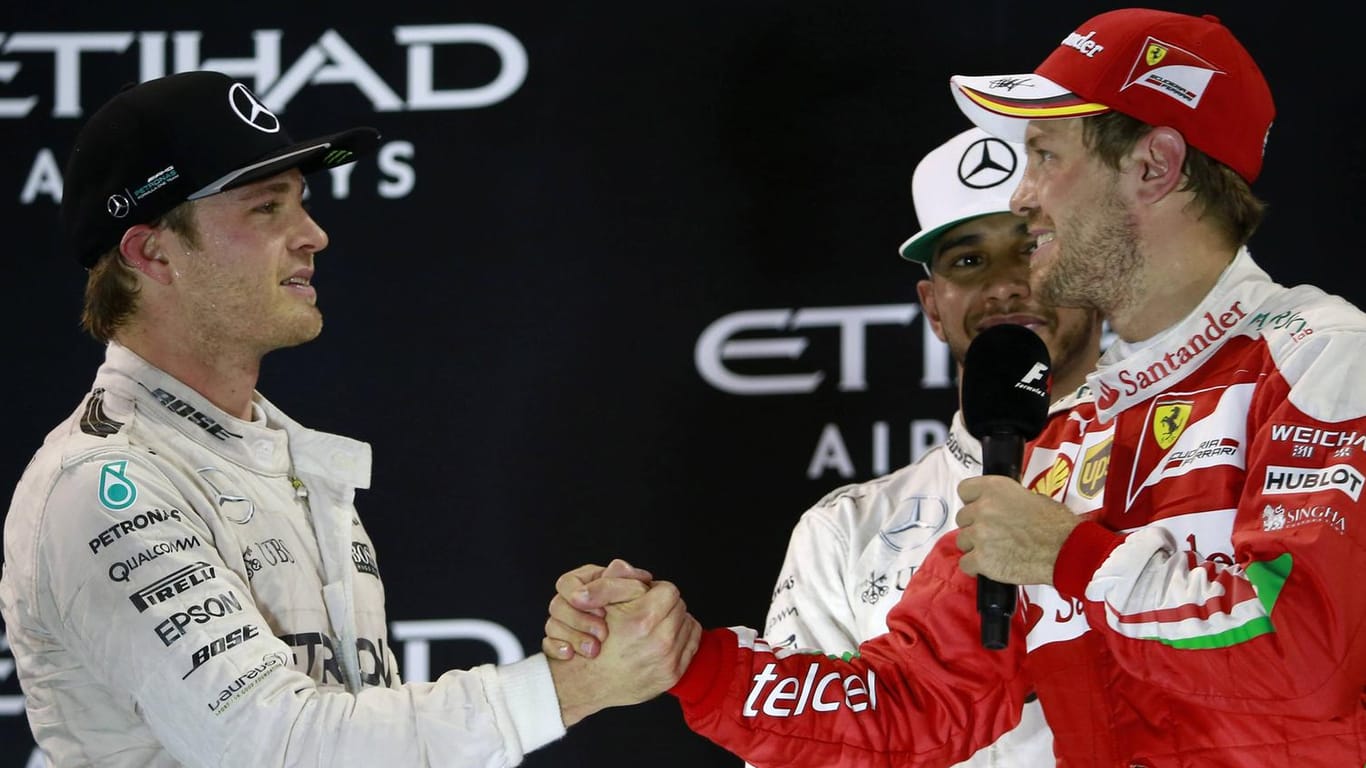 Deutsche Weltmeister unter sich: Nico Rosberg (li.) und Sebastian Vettel.