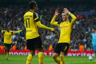 Torschützen unter sich: Pierre-Emerick Aubameyang und Marco Reus (rechts) sicherten Dortmund mit ihren Treffern noch ein Remis in Madrid.