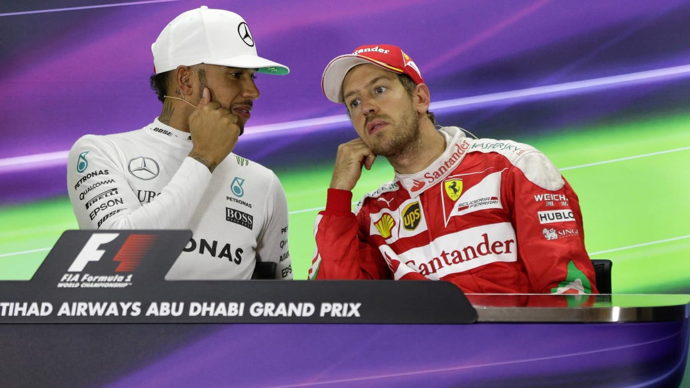 Ferrari-Pilot Sebastian Vettel (re.) wird als kommender Teamkollege von Lewis Hamilton bei Mercedes gehandelt.
