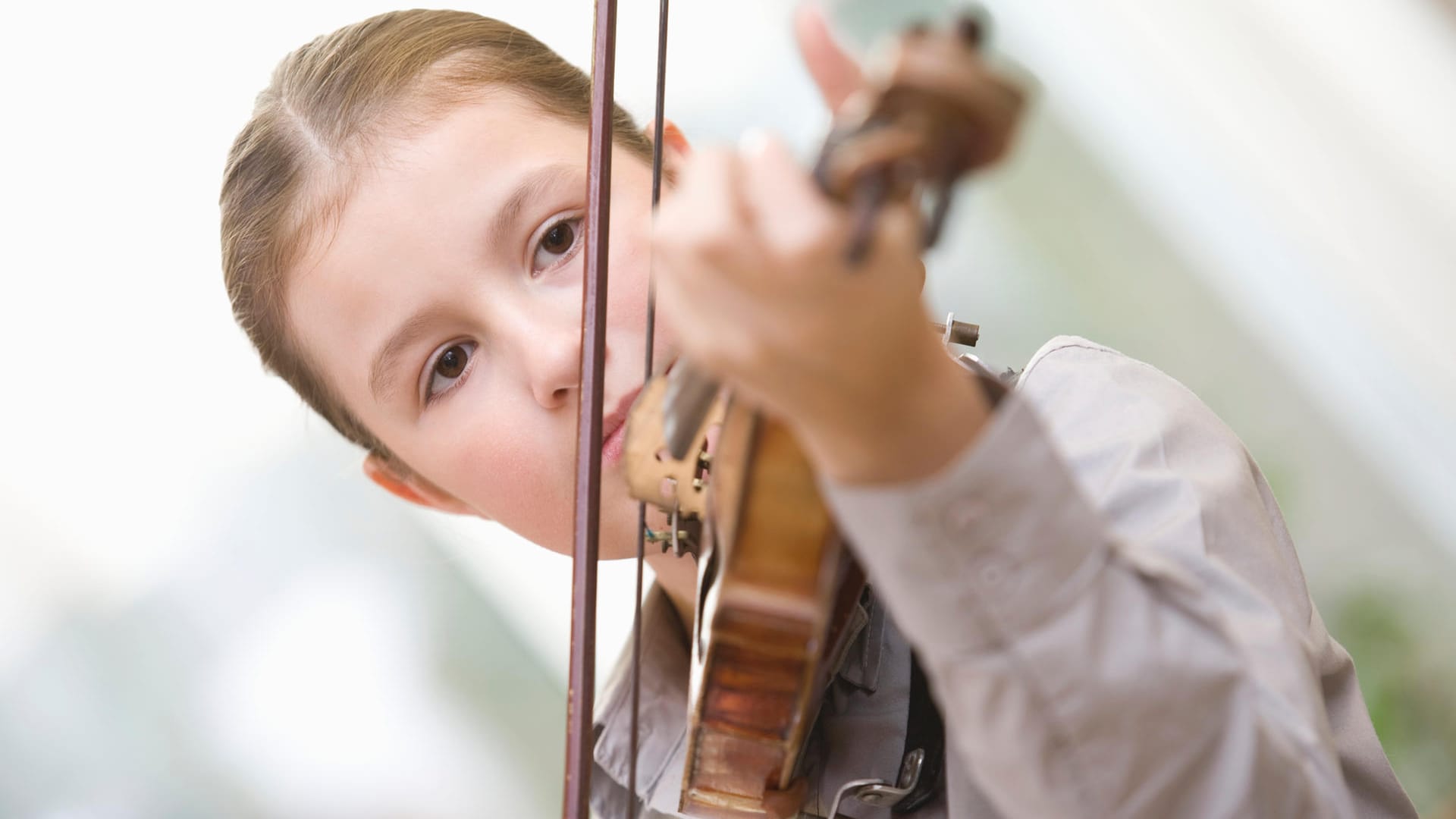 Young girl playing violin