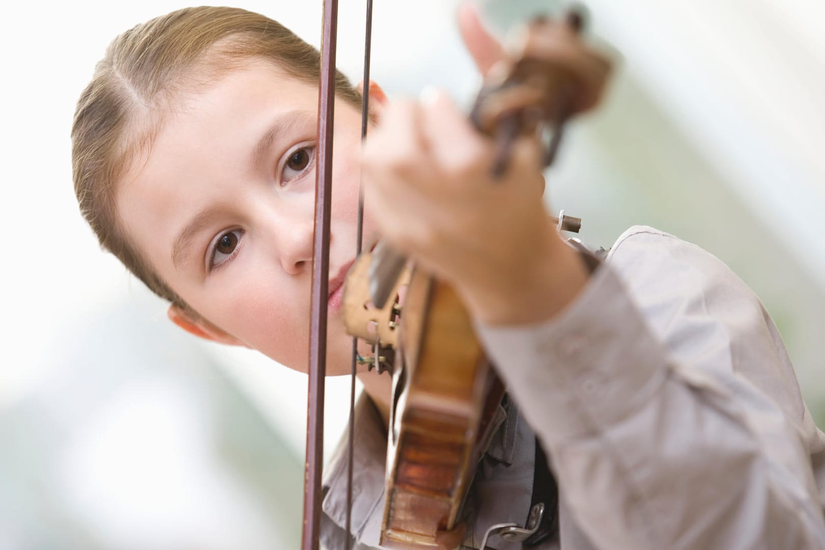 Young girl playing violin