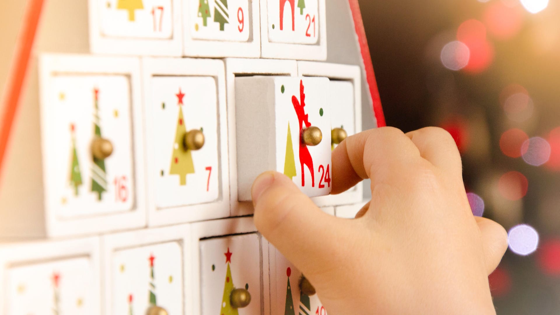 Wooden advent calendar Christmas tree and child