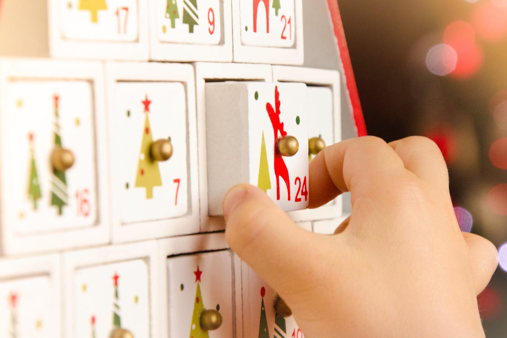 Wooden advent calendar Christmas tree and child