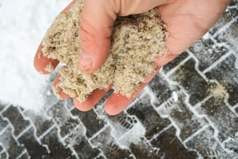 Hand with road salt