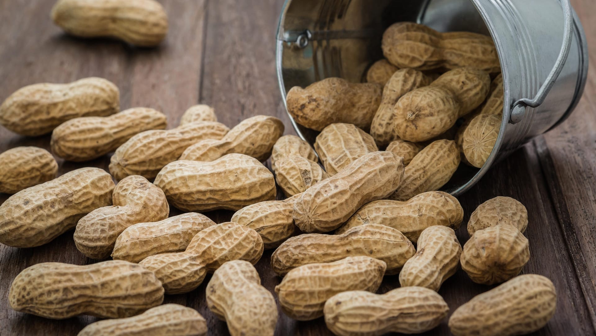 Peanuts on wooden table