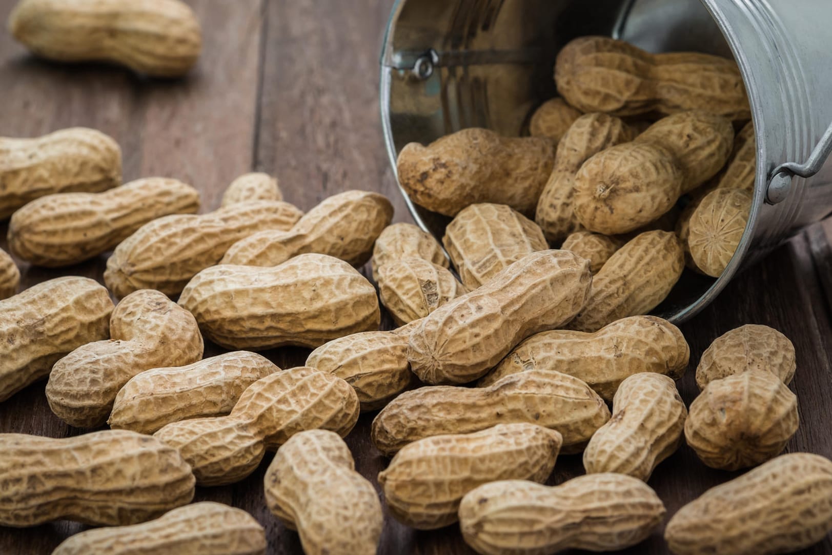 Peanuts on wooden table