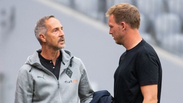 Die Bayern um Trainer Julian Nagelsmann (r) treffen zum Saisonauftakt auf Mönchengladbach mit Coach Adi Hütter. Die Bayern um Trainer Julian Nagelsmann (r) treffen zum Saisonauftakt auf Mönchengladbach mit Coach Adi Hütter.